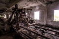 Old abandoned silo elevator with rusty equipment left