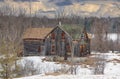 Old abandoned spooky looking farmhouse in winter on a farm yard in rural Canada Royalty Free Stock Photo