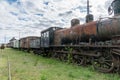 Old abandoned steam locomotive with train set Royalty Free Stock Photo