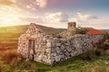 Old abandoned stone house without the roof. Sunset time. Rural Irish farm building. Dramatic sky. Old architecture example. Top Royalty Free Stock Photo