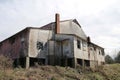 Old abandoned stone wood farm barn building Royalty Free Stock Photo