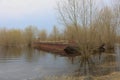 an old abandoned sunken rusty barge