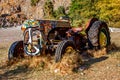 old abandoned tractor on the beach in the Valley of Butterflies in Turkey Royalty Free Stock Photo