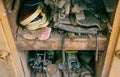 abandoned trash from tools lies on the shelf of a rusty workbench