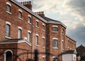 Old abandoned Victorian workhouse with dramatic sky