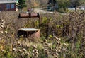 An abandoned drinking water well in a mountain village indicates the absence of signs of human habitation and the use of it as a s