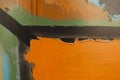 Old abandoned wall with fragment of orange, brown, green colors graffiti painting. Part of colorful street art graffiti Royalty Free Stock Photo