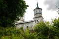 An old abandoned church next to the trees Royalty Free Stock Photo