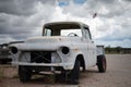 Old abandoned white pickup truck, Chevrolet Task Force
