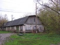 Old abandoned wooden building stable long barn