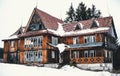 Old abandoned wooden hotel in the Carpathian Mountains. Traveling in Eastern Europe Royalty Free Stock Photo