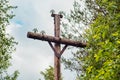 Vintage abandoned wooden post with insulator