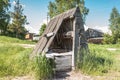 Old abandoned wooden well with beautiful structure in the Siberian village Royalty Free Stock Photo