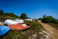 Old abandoned wrecked fishing boat at ship or boat graveyard.