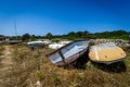 Old abandoned wrecked speed boat at ship or boat graveyard.