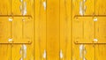 Old abstract yellow colorful painted exfoliate peeled off rustic wooden boards, wooden gate, wooden door texture - wood wall