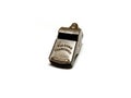 Old Acme Thunderer snail escargot railway guard whistle. Nickel plated. White background. Copyspace