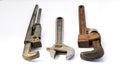 Old adjustable pipe wrenches on a white background Royalty Free Stock Photo