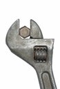 Old adjustable spanner with bolt Royalty Free Stock Photo