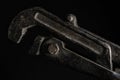 Old adjustable wrench close up photo Royalty Free Stock Photo