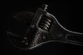 Old adjustable wrench close up photo Royalty Free Stock Photo