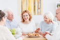 Happy seniors chatting at cafe Royalty Free Stock Photo