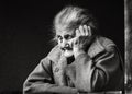 Very old and tired wrinkled woman outdoors Royalty Free Stock Photo