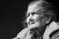 Very old and tired wrinkled woman outdoors Royalty Free Stock Photo