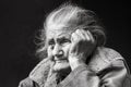 Very old and tired wrinkled woman outdoors Royalty Free Stock Photo