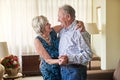 Old by age but young at heart. a happy senior couple dancing together at home. Royalty Free Stock Photo