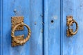 Old and aged blue historic church wooden door in the city of Sabara Royalty Free Stock Photo
