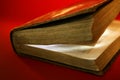 Old aged book close up, light glowing inside Royalty Free Stock Photo