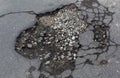 Old aged grey cracked bad asphalt road surface