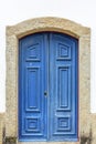 Old and aged historic wooden blue church door Royalty Free Stock Photo