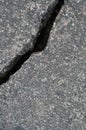 Old aged weathered cracked grey black tarmac texture pattern, large detailed damaged textured asphalt grungy background flat lay Royalty Free Stock Photo