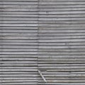 Old aged weathered natural grey damaged wooden farm shack wall texture, large detailed textured rustic grungy vertical background Royalty Free Stock Photo