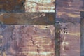 Old aged weathered rusty corroded coat iron sheets texture pattern, multiple horizontal rusted corroding grunge metal patch plates Royalty Free Stock Photo