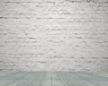 Old aged white bricks wall with wooden floor background Royalty Free Stock Photo