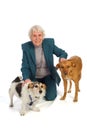 Old aged woman with pets Royalty Free Stock Photo