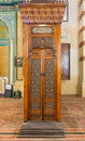 Old aged wooden door of Minbar of Imam Al Shafii Mosque with arabesque decorations, Cairo, Egypt