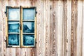 Old and aged wooden window with lines and patternes Royalty Free Stock Photo