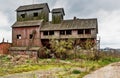 Old agricultural granary. Abandoned, forlorn collective farm. Royalty Free Stock Photo