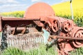 Old agricultural machine abandons in field Royalty Free Stock Photo