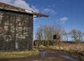 An Old Aircraft Hangar, now being used as a Farmers Store at the Old Condor Airfield. Royalty Free Stock Photo