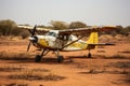 Old airplane in the desert of the Namib Desert, Namibia, small prop plane, landing on dirt landing strip in Africa, AI Generated Royalty Free Stock Photo