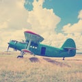 Old airplane on green grass Royalty Free Stock Photo