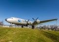 Old airplane on green meadow in sunlight Royalty Free Stock Photo