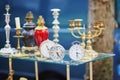 Old alarm clocks and candle holders on flea market in Paris Royalty Free Stock Photo