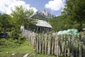 Old Albanian stone house with wooden roof in village of Valbona, Albania Royalty Free Stock Photo