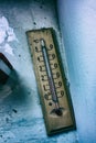 Old alcohol thermometer in the room